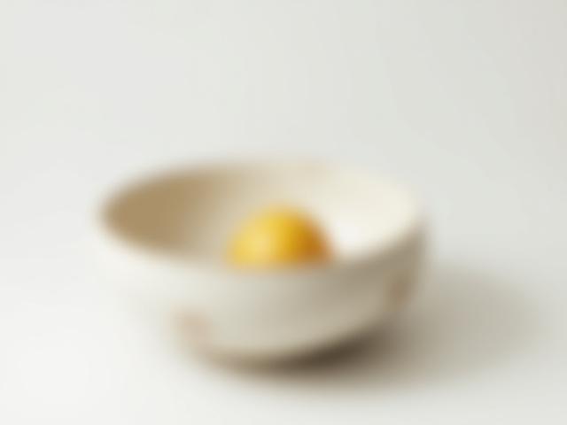 Zen Breakfast Bowl, a minimalist ceramic bowl with a smooth glaze inside and rustic exterior.